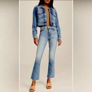 MOTHER Light Wash Cropped Flare Jeans in Blue